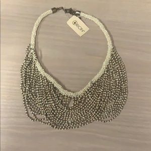 White and gold statement necklace